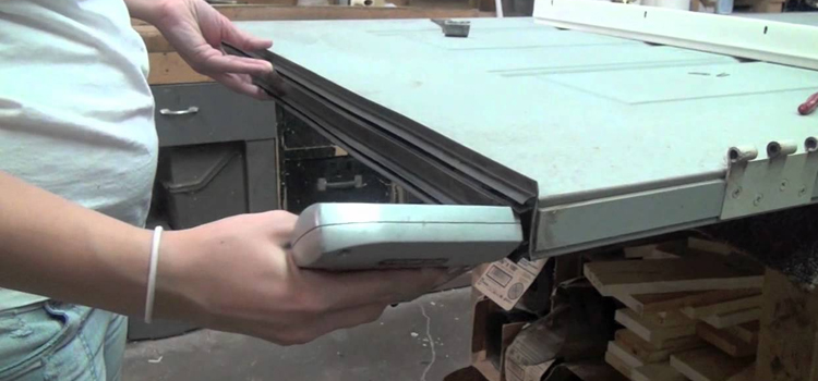 damaged steel door repair Midway City